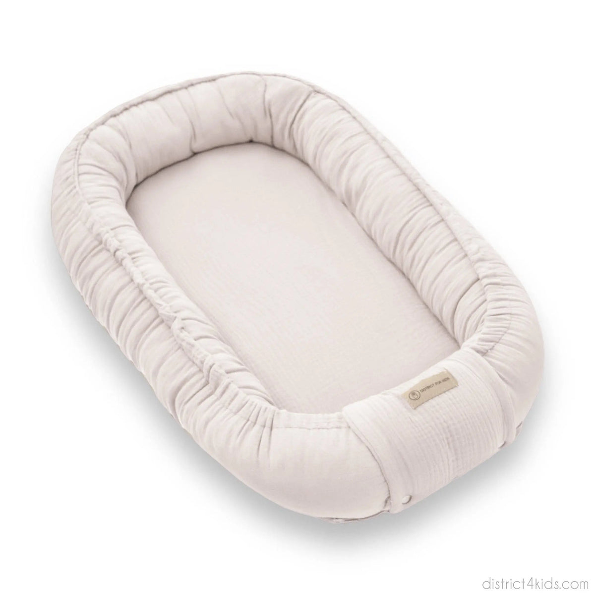 Babynest Musselin beige – atmungsaktiv & mitwachsend